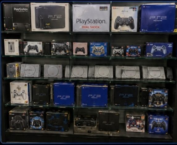 Shelves of classic PlayStation consoles